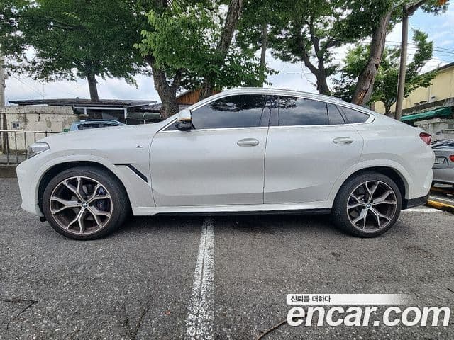 BMW X6 2021 — ფოტო 7/20
