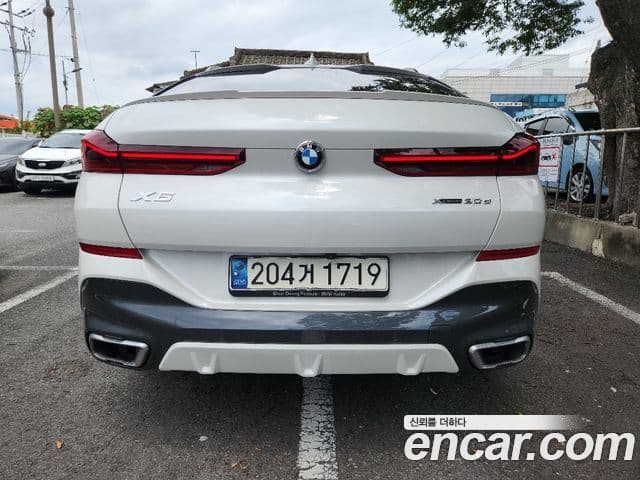 BMW X6 2021 — ფოტო 8/20