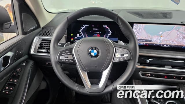 BMW X5 2025 — ფოტო 13/20