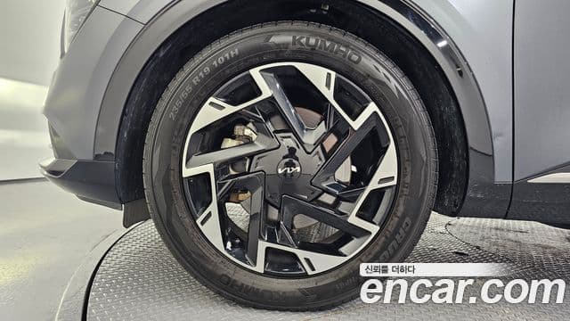 Kia Sportage 2021 — ფოტო 5/20