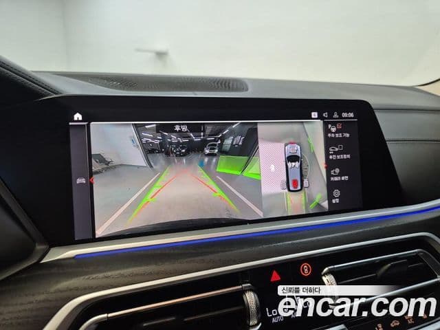 BMW X7 2022 — ფოტო 15/20