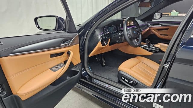 BMW 5 Series 2023 — ფოტო 10/20