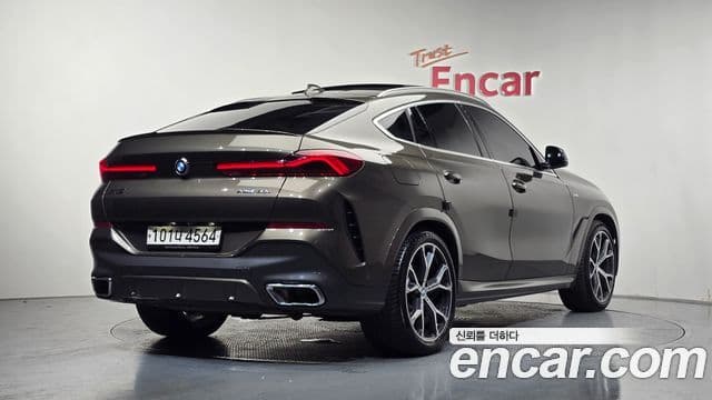 BMW X6 2021 — Фото 2/20