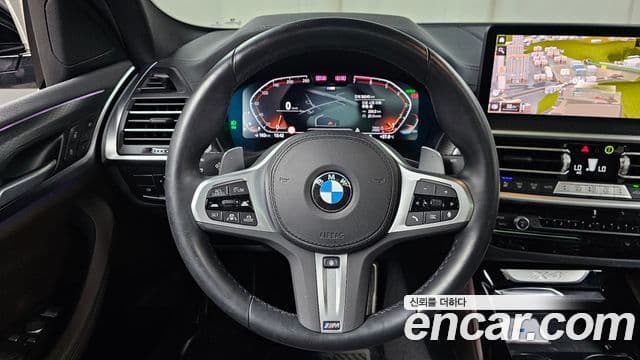 BMW X4 2023 — ფოტო 13/20