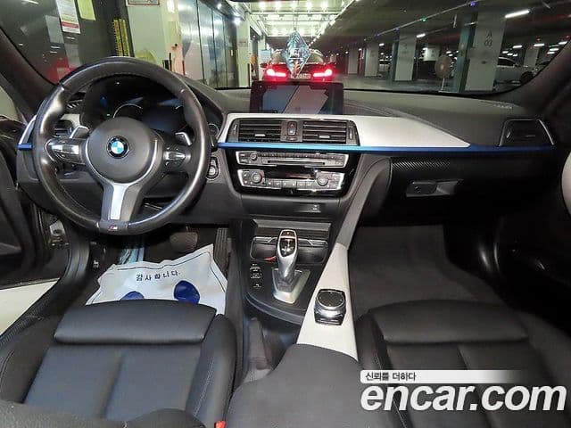 BMW 3 Series 2018 — ფოტო 8/20