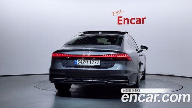 Audi A7 2021 — ფოტო 4/20