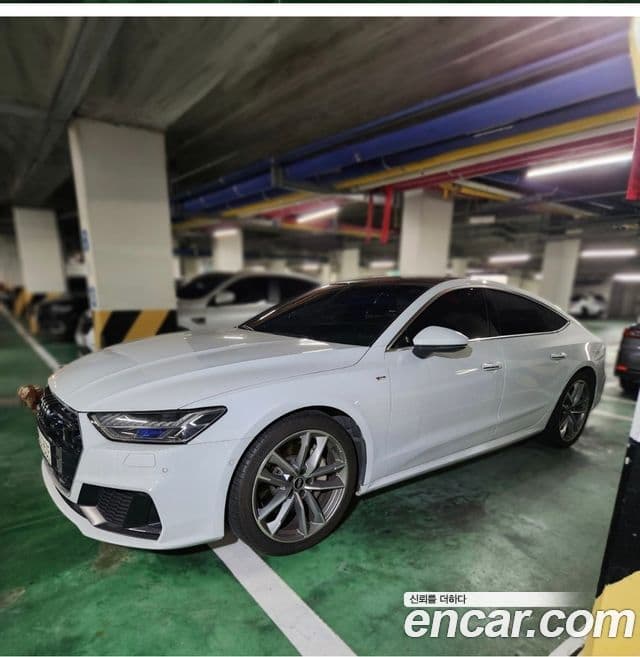 Audi A7 2021 — ფოტო 1/9