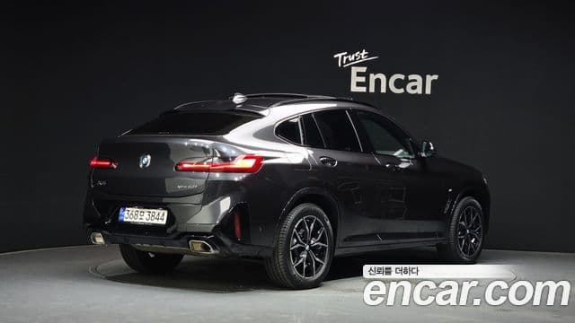 BMW X4 2023 — Фото 2/20