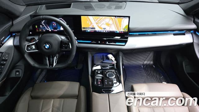 BMW 5 Series 2024 — ფოტო 7/20