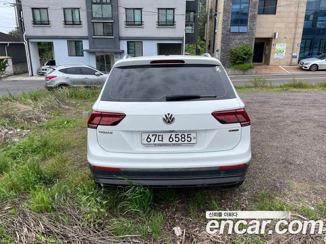 Volkswagen Tiguan 2018 — Фото 1/9