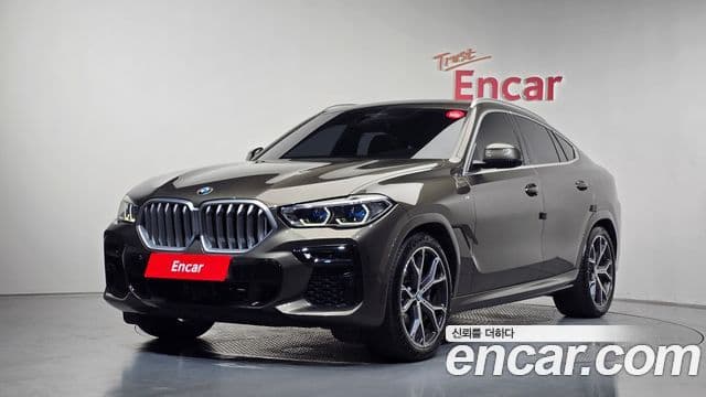 BMW X6 2023 — Фото 1/20