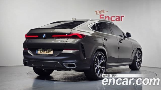 BMW X6 2023 — Фото 2/20