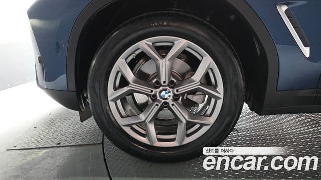 BMW X4 2023 — Photo 26/38