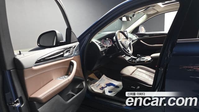 BMW X4 2023 — Photo 19/38