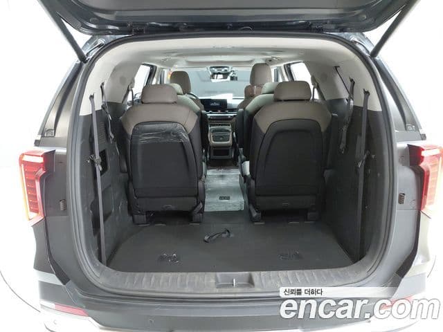 Kia Carnival 2023 — Фото 19/20