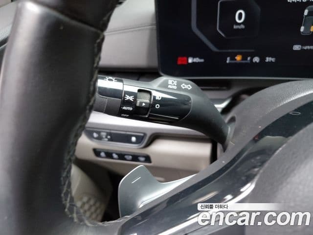 Kia Carnival 2023 — ფოტო 14/33