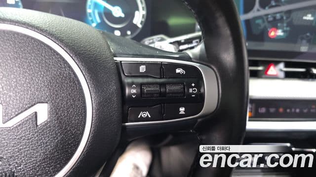Kia Sportage 2023 — Photo 1/35