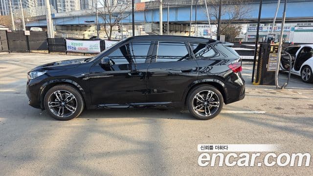 BMW X1 2023 — ფოტო 12/14