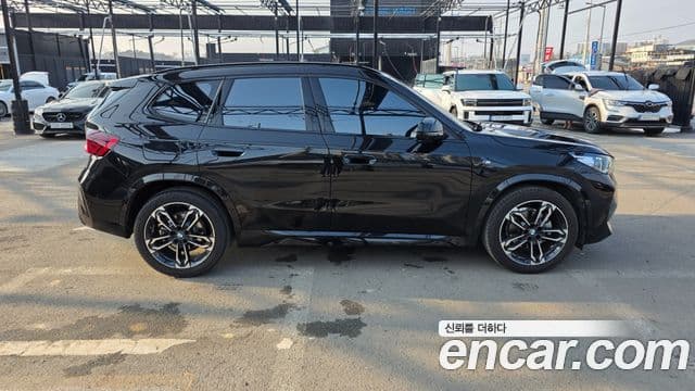 BMW X1 2023 — ფოტო 13/14