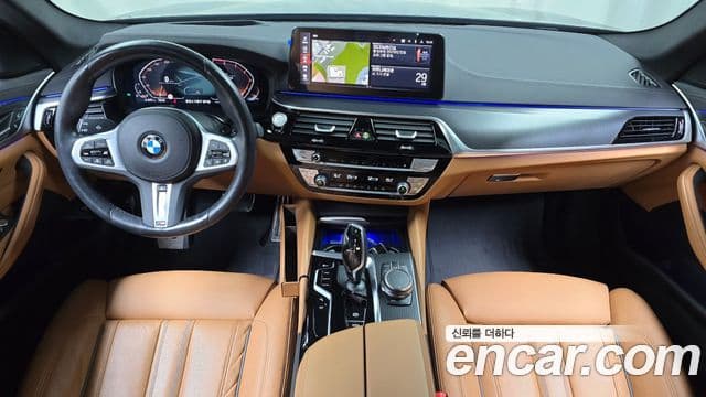 BMW 5 Series 2023 — ფოტო 7/20
