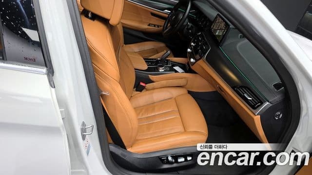 BMW 5 Series 2023 — Фото 12/20