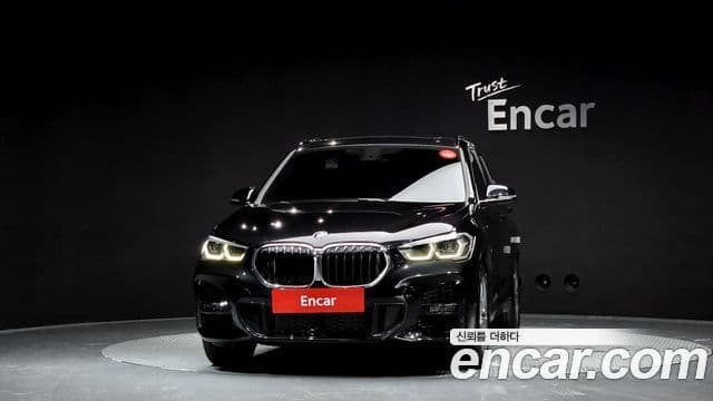 BMW X1 2021 — ფოტო 19/20