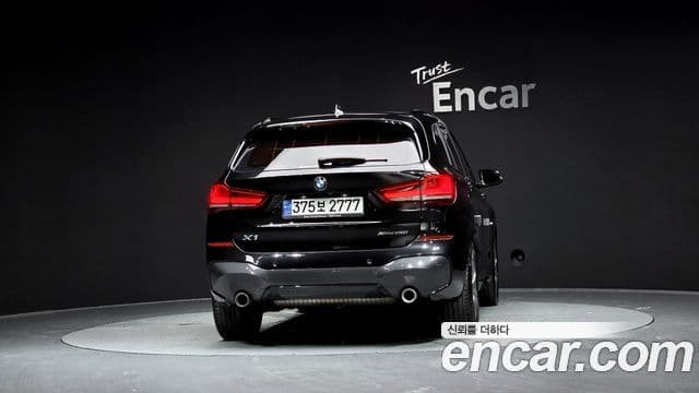 BMW X1 2021 — ფოტო 9/20