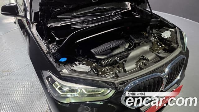 BMW X1 2021 — ფოტო 14/20