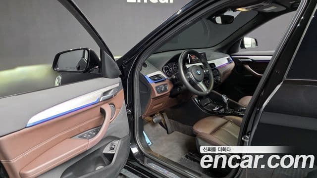 BMW X1 2021 — ფოტო 15/20