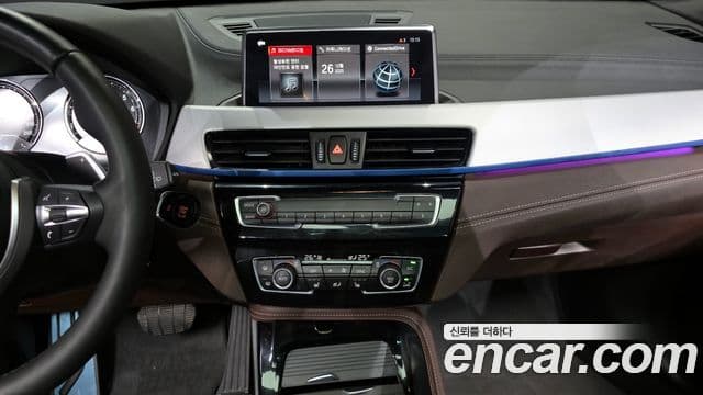 BMW X1 2021 — ფოტო 18/20