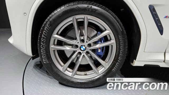BMW X3 2021 — ფოტო 15/20