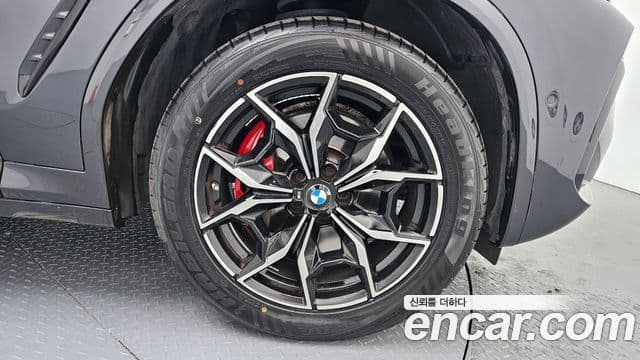 BMW X4 2023 — ფოტო 4/20