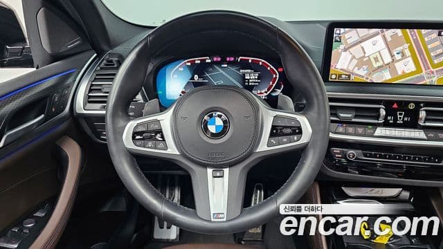 BMW X4 2023 — ფოტო 12/20