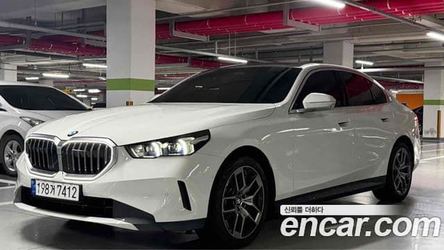 BMW 5 Series 2024 — ფოტო 1/14