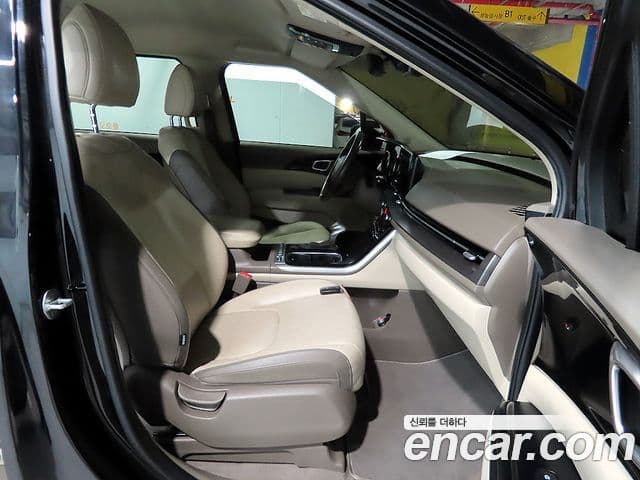 Kia Carnival 2021 — ფოტო 7/20