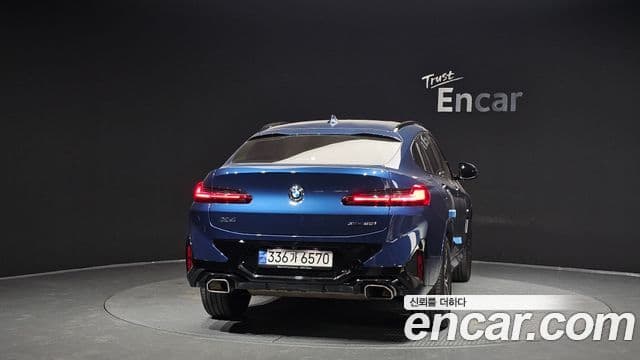 BMW X4 2023 — ფოტო 4/20
