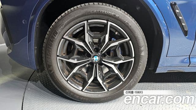 BMW X4 2023 — ფოტო 5/20