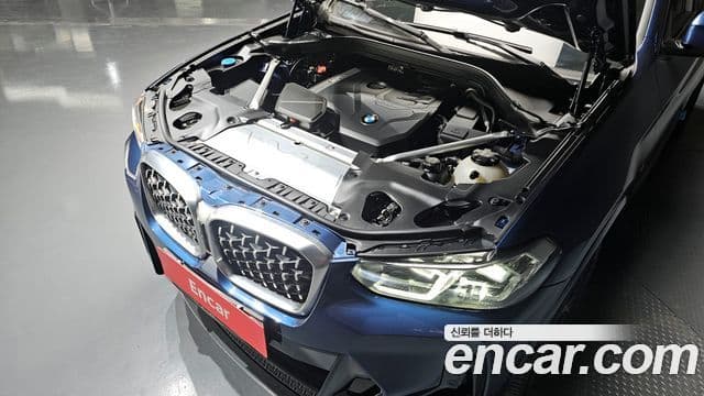 BMW X4 2023 — ფოტო 6/20