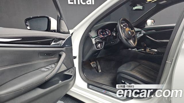 BMW 5 Series 2023 — ფოტო 10/20