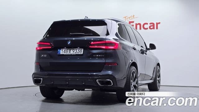 BMW X5 2022 — ფოტო 1/20