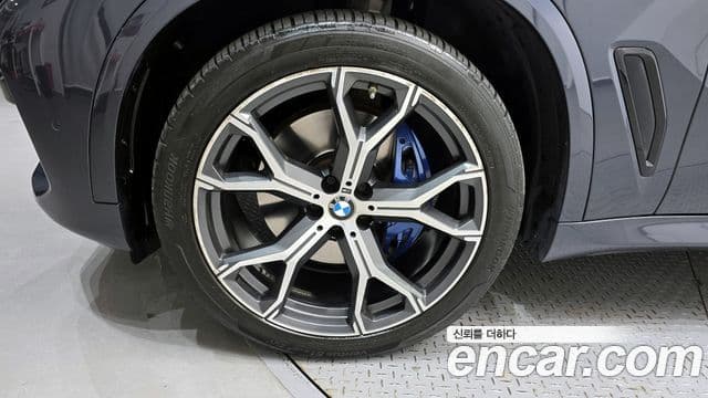 BMW X5 2022 — ფოტო 4/20