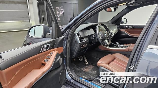 BMW X5 2022 — ფოტო 8/20