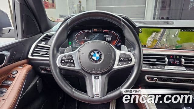 BMW X5 2022 — ფოტო 14/20