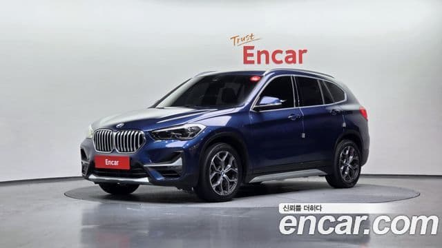 BMW X1 2021 — ფოტო 1/20