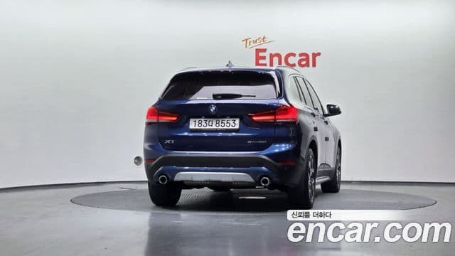 BMW X1 2021 — ფოტო 4/20