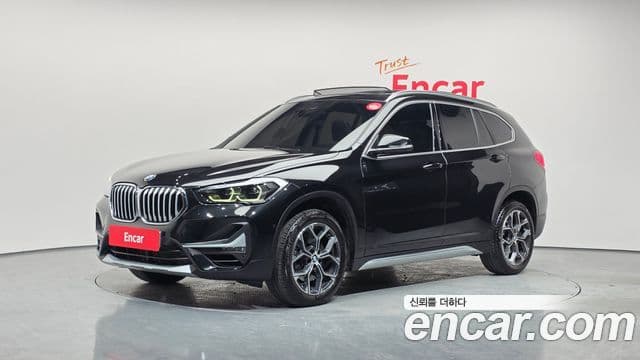 BMW X1 2022 — ფოტო 1/20