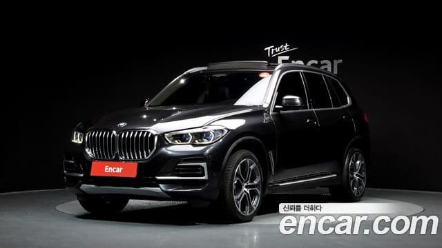 BMW X5 2021 — ფოტო 1/20