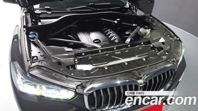 BMW X5 2021 — ფოტო 6/20
