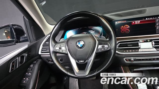 BMW X5 2021 — ფოტო 13/20