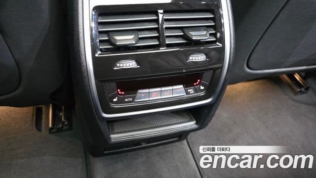 BMW X5 2021 — ფოტო 18/20